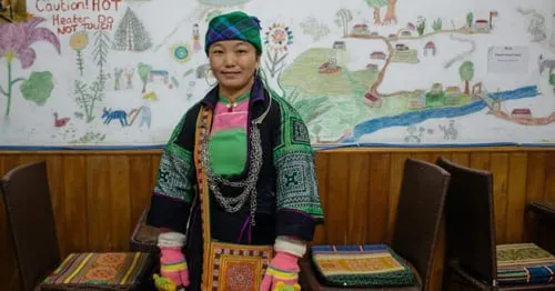 Cở sinh năm 1985, đã lập gia đình và có hai con. Alt: Chân dung hướng dẫn viên du lịch Sapa - Cở.