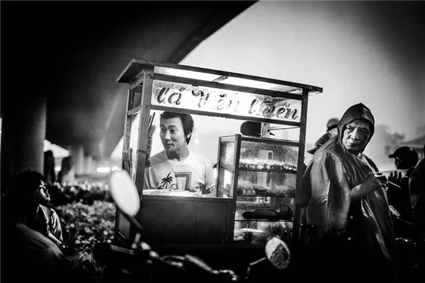 Người Sài Gòn lạc quan, yêu đời. (Ảnh: Neil Massey)