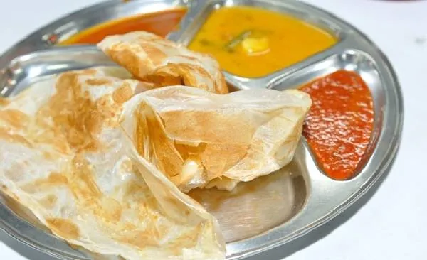 Roti Canai - bánh mì dẹt chiên giòn. Ảnh: Gokl.my